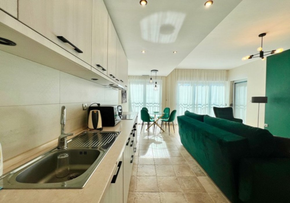 Boka Bay of Kotor, Dobrota district. Two-bedroom apartment in a new residential complex with swimming pools.

Distance to the sea 350m

The area is 75