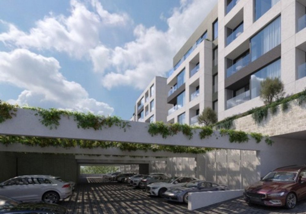 Tivat. A new multi-apartment residential complex with two outdoor pools in the immediate vicinity of the city center, surrounded by greenery and in th