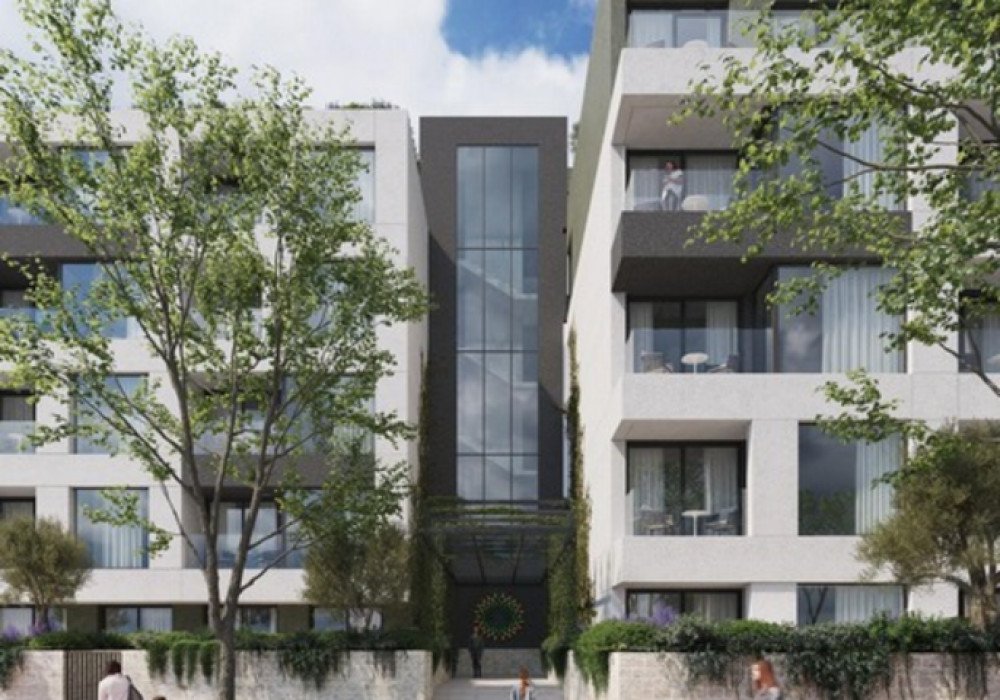 Tivat. A new multi-apartment residential complex with two outdoor pools in the immediate vicinity of the city center, surrounded by greenery and in th