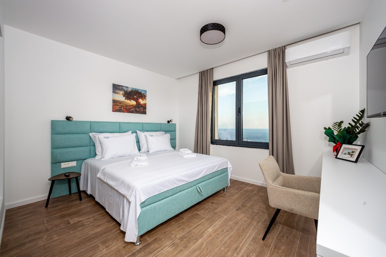 ‍

LOCATION 
‍This villa is located Budva Municipality, 14km away from the city center. The sea and the beach are 700m away from the villa. Tivat airp