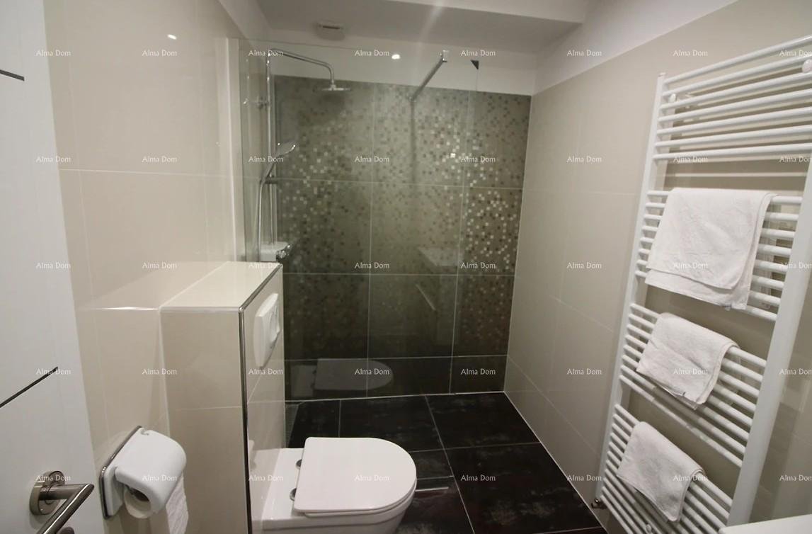 Haus Pješčana uvala, Haus im Zentrum des Ortes.