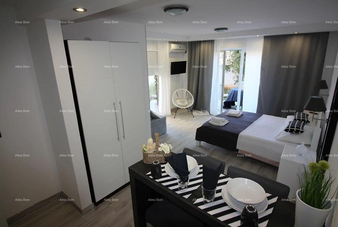 Haus Pješčana uvala, Haus im Zentrum des Ortes.