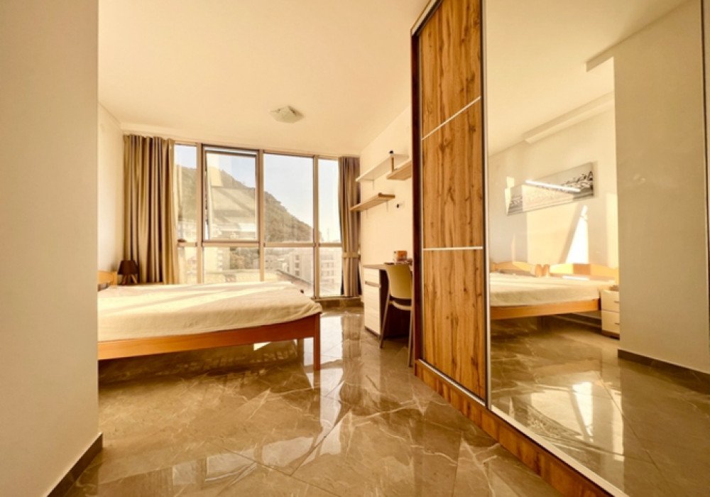 Budva Riviera, Rafailovichi district. One bedroom apartment in a new house.Distance to the sea 200m.Open poolArea 63 sq.m.Floor - sixthThe house is...