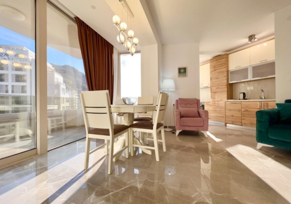 Budva Riviera, Rafailovichi district. One bedroom apartment in a new house.Distance to the sea 200m.Open poolArea 63 sq.m.Floor - sixthThe house is...
