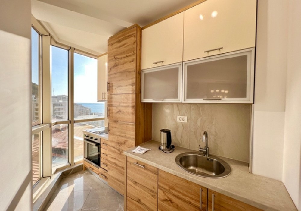 Budva Riviera, Rafailovichi district. One bedroom apartment in a new house.Distance to the sea 200m.Open poolArea 63 sq.m.Floor - sixthThe house is...