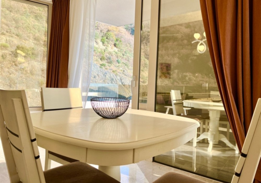 Budva Riviera, Rafailovichi district. One bedroom apartment in a new house.Distance to the sea 200m.Open poolArea 63 sq.m.Floor - sixthThe house is...