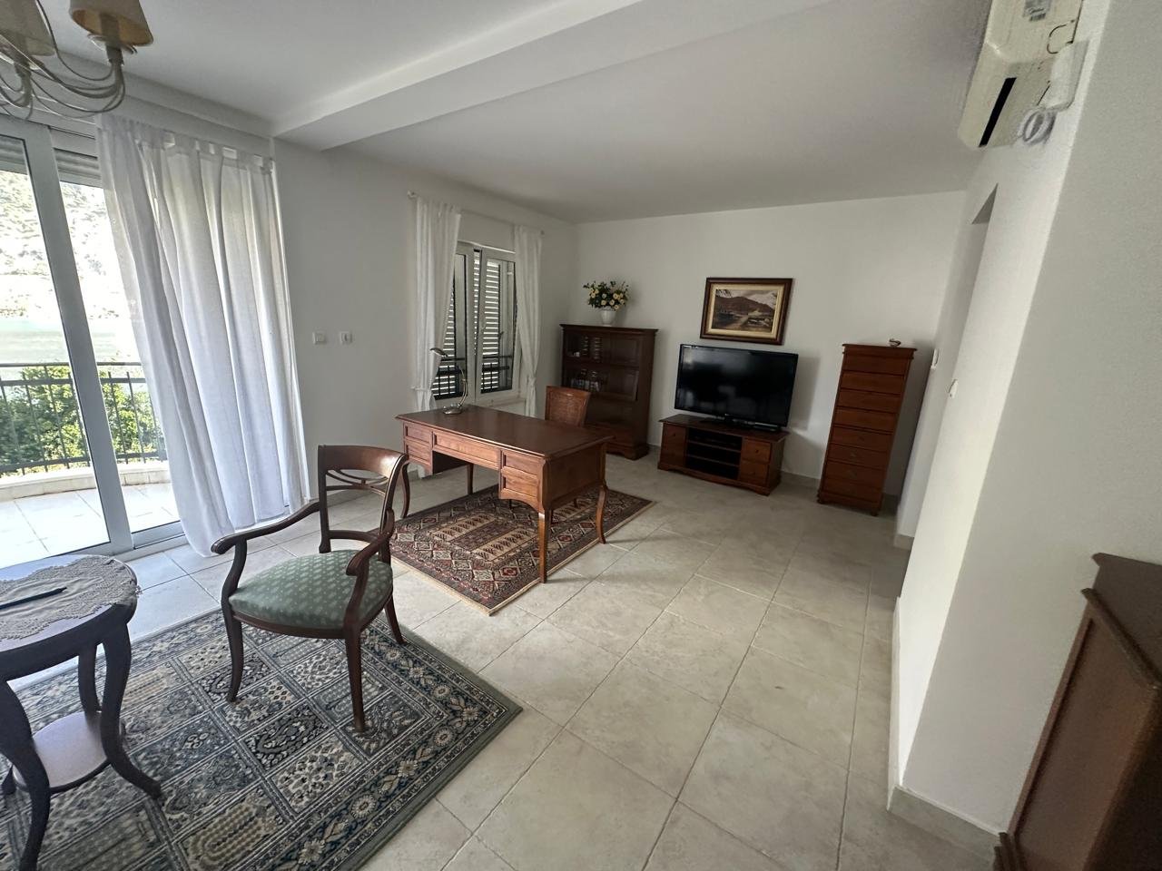 ‍‍LOCATIONThis house is located in Kotor Municipality, 2km away from the city center. The sea and the beach are 100m away from the house. Tivat air...