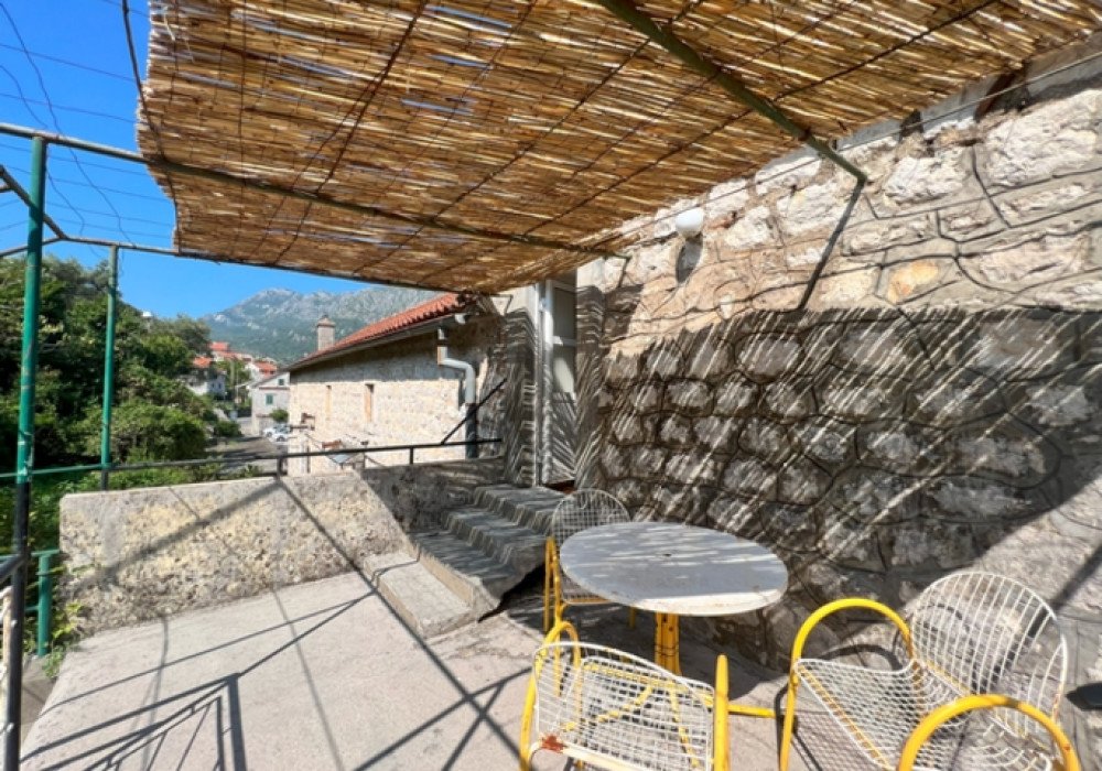 Boka Bay of Kotor, Koshtanica district.  An old three-storey house on the first line by the seaHouse made of natural stoneYear of construction -179...