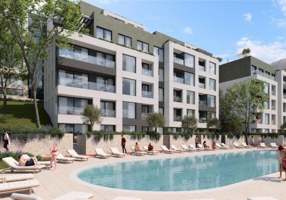 tivat: Tivat. A new multi-apartment residential complex with two outdoor pools in the immediate vicinity of the city center surrounded by greenery and in the 