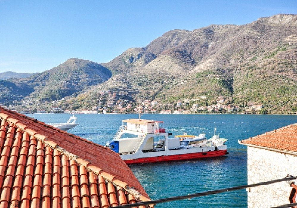 Tivat Riviera, Lepetane district. Three-storey house made of natural stone on the second line from the seaAny payment options are possible, includi...